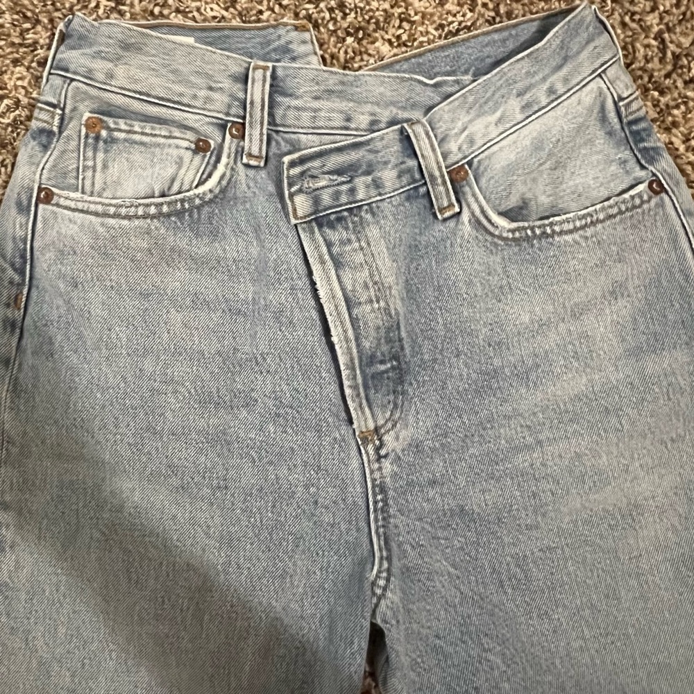 Agolde criss cross straight denim jeans size 25. New without tags. Never worn.
